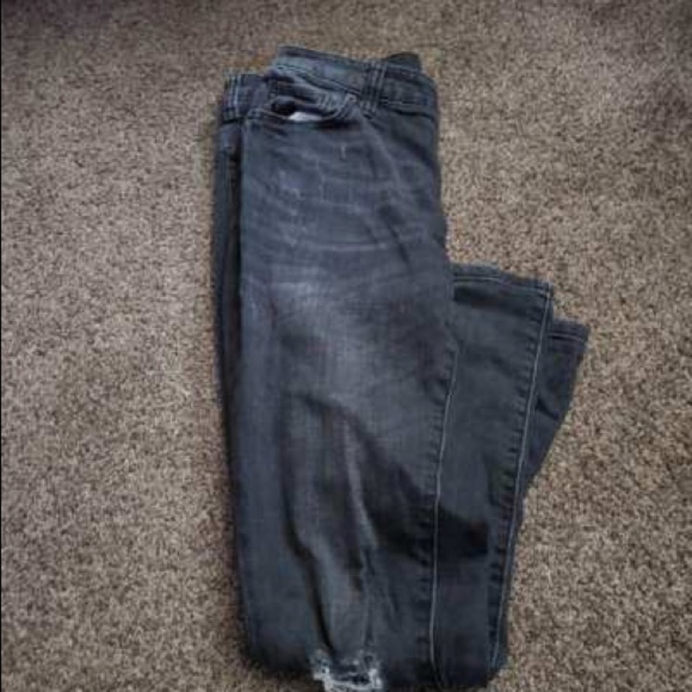 black ripped jeans
